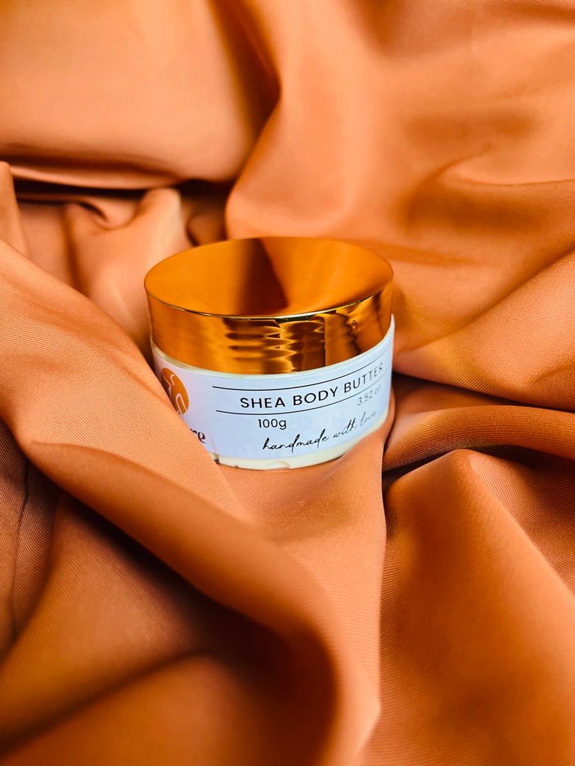 White jar with orange satin and gold lid — RithCare Body Butter 100g